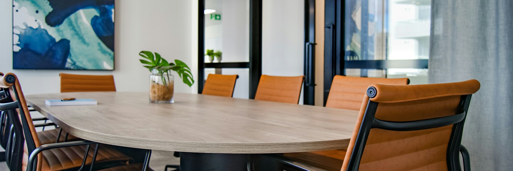 Bright, modern meeting room with a conference table